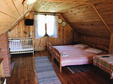Фото номера Семейный номер с видом на сад Гостевой дом Guest House Viesu Māja Klētnieki г. Ģipka 11