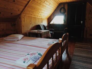 Фото номера Семейный номер с видом на сад Гостевой дом Guest House Viesu Māja Klētnieki г. Ģipka 6